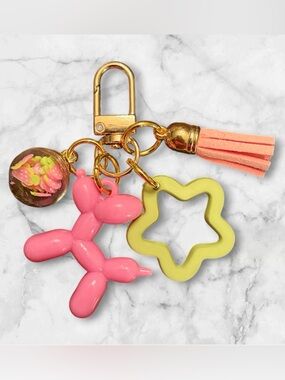 Pink Balloon Dog Keychain with Yellow Star Charm and Coral Tassel